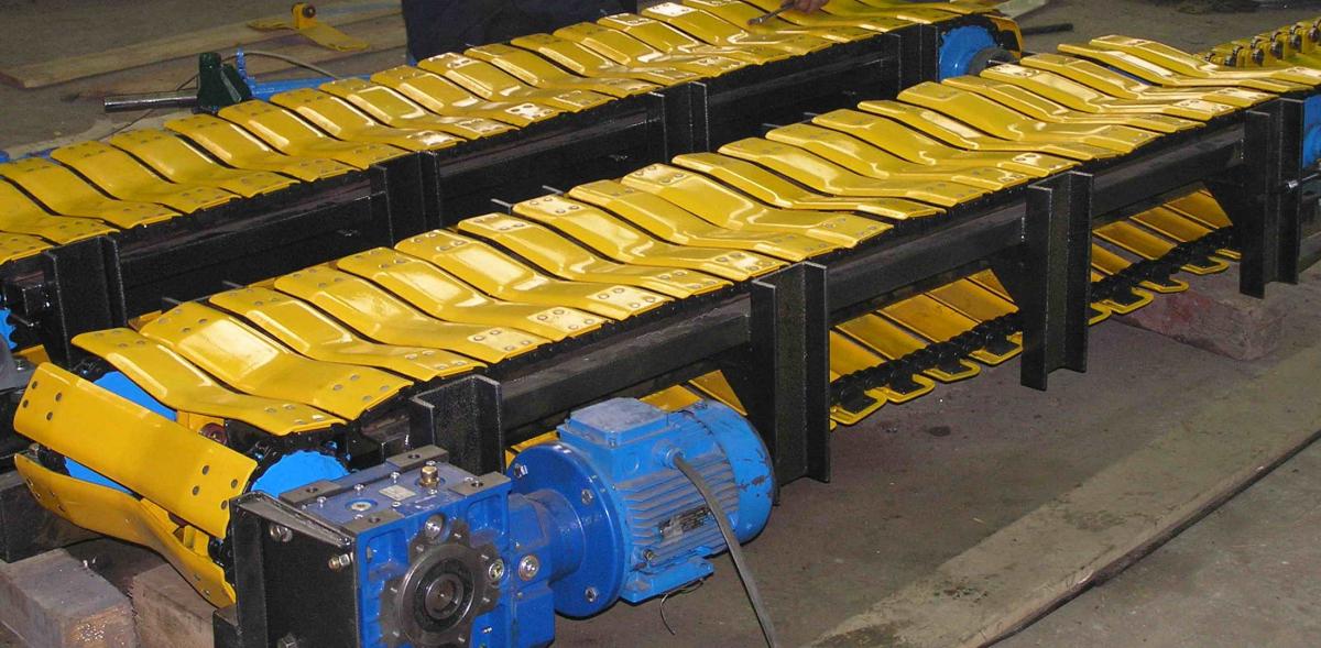 Пластинчатый конвейер для рулонов